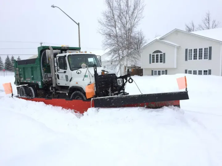 Moncton snow plough clearing a residential street
